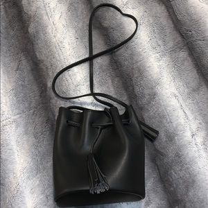 Bucket crossbody with tassel